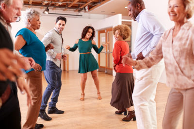 One of the health benefits of dancing for seniors is that it improves strength and balance.