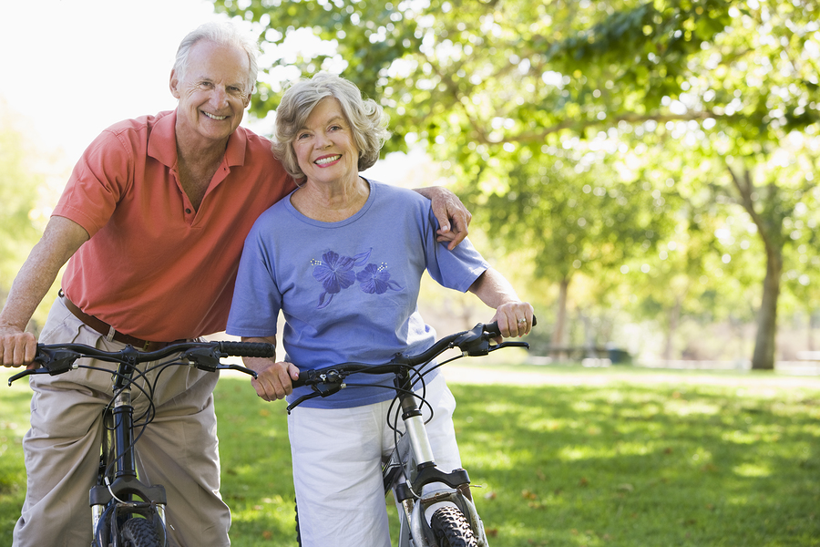 These spring workout ideas for seniors include bike riding.