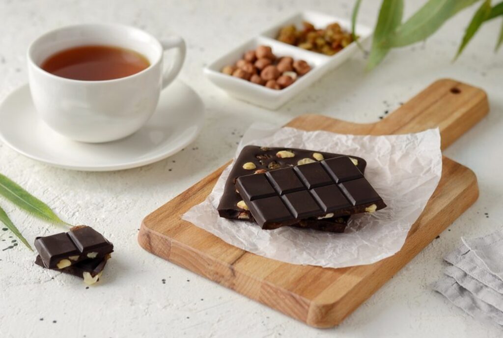 The health benefits of dark chocolate include lowering stress and improving skin health.