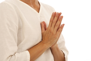 A person meditating in a peaceful setting