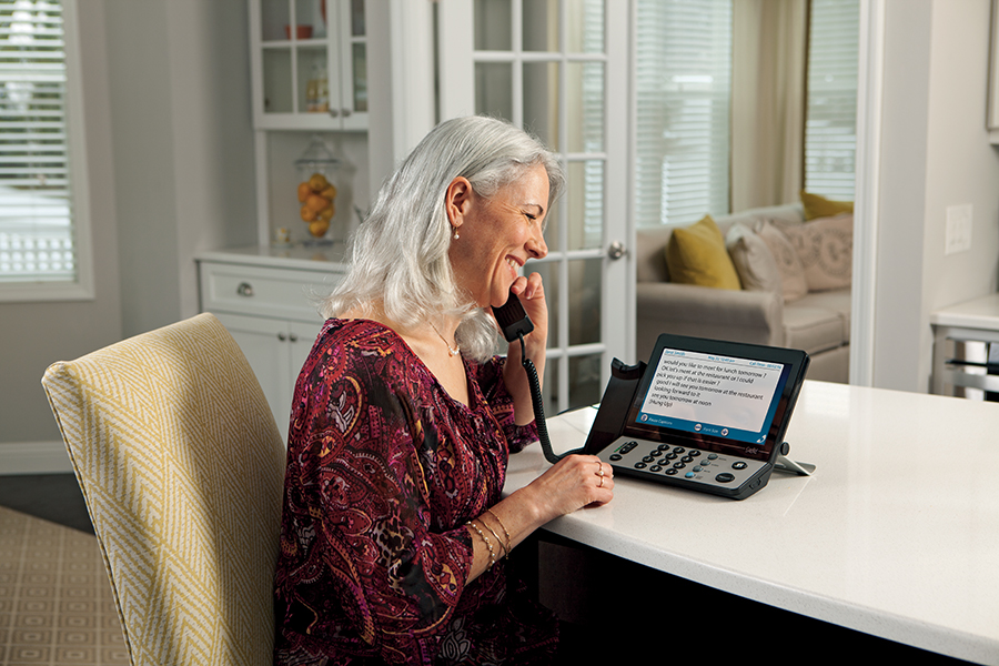 Devices like captioned phones and hearing aids are essential for improving accessibility for individuals with hearing impairments. These tools help people communicate effectively and stay connected with others