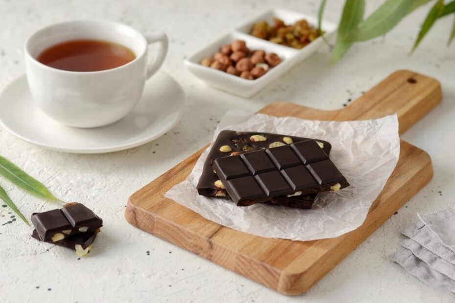 A close-up image of a piece of dark chocolate