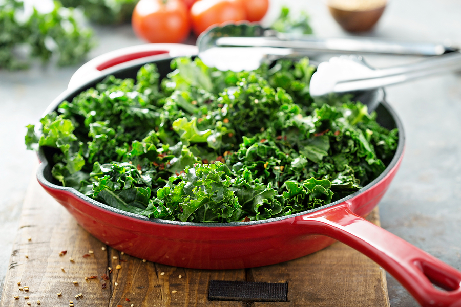 A close-up image of fresh kale leaves