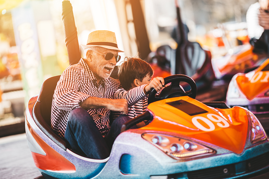 A person with hearing loss enjoying a scenic travel destination during a long weekend getaway.