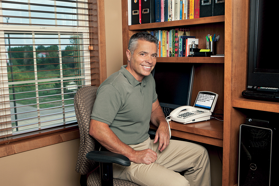 Image of a person with hearing loss in a work environment