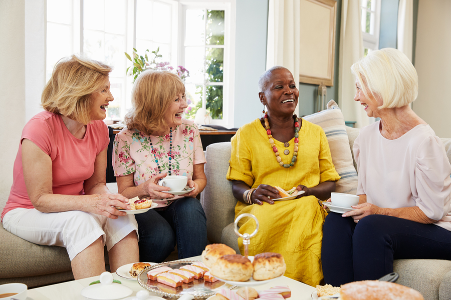 Image of a person using assistive technology for hearing loss support and communication solutions.