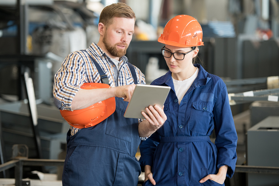 Image of a person wearing ear protection in a noisy industrial setting