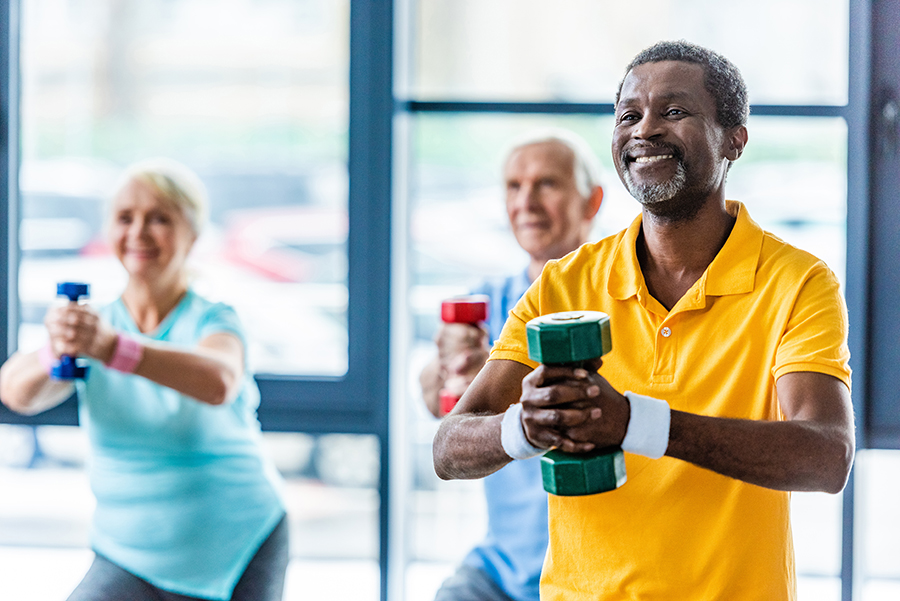 An image of a group of seniors participating in a fitness class