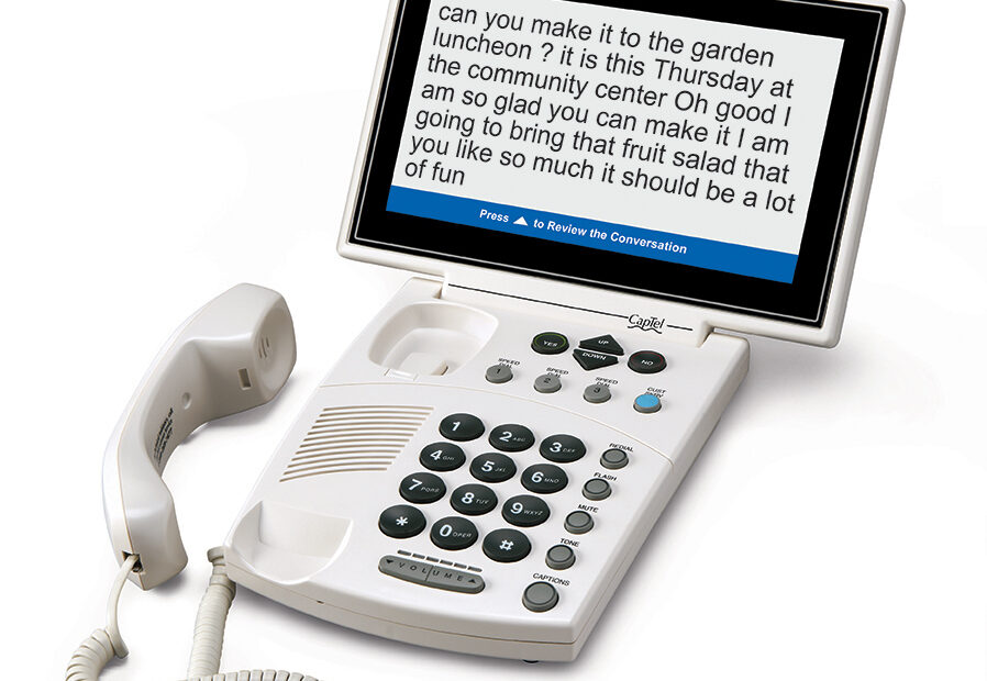 Phone for hearing impaired with captioned telephone feature for individuals with hearing loss