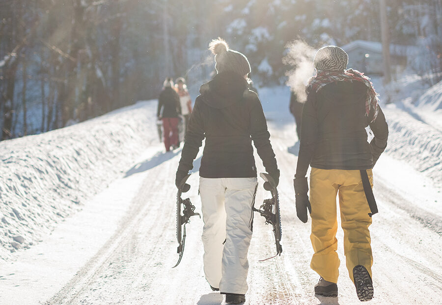 A person with hearing loss enjoying a ski trip with accessibility accommodations.