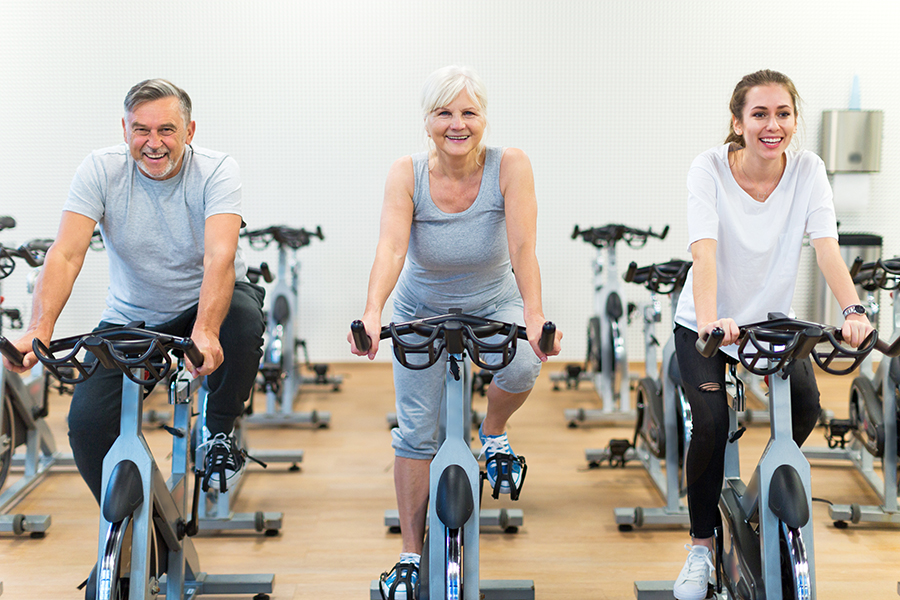 A diverse group of people participating in a group fitness class