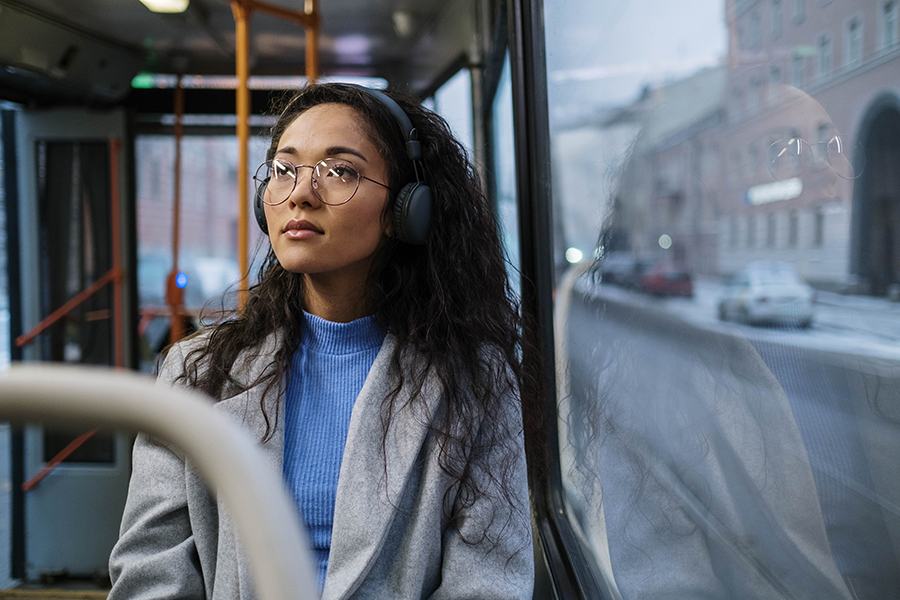 Image of a person with hearing loss using public transportation