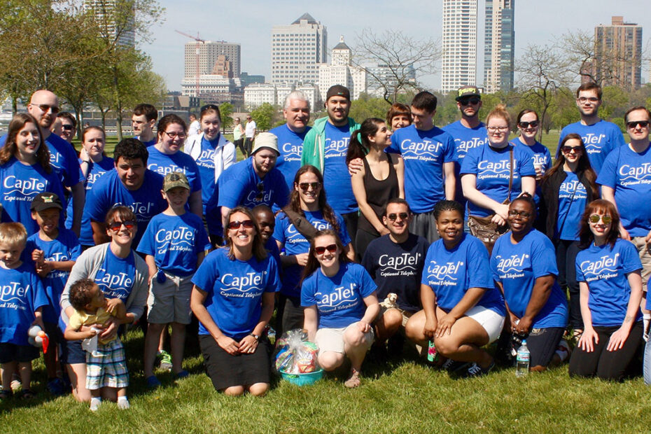 A group of people participating in the HLAA Walk4Hearing event