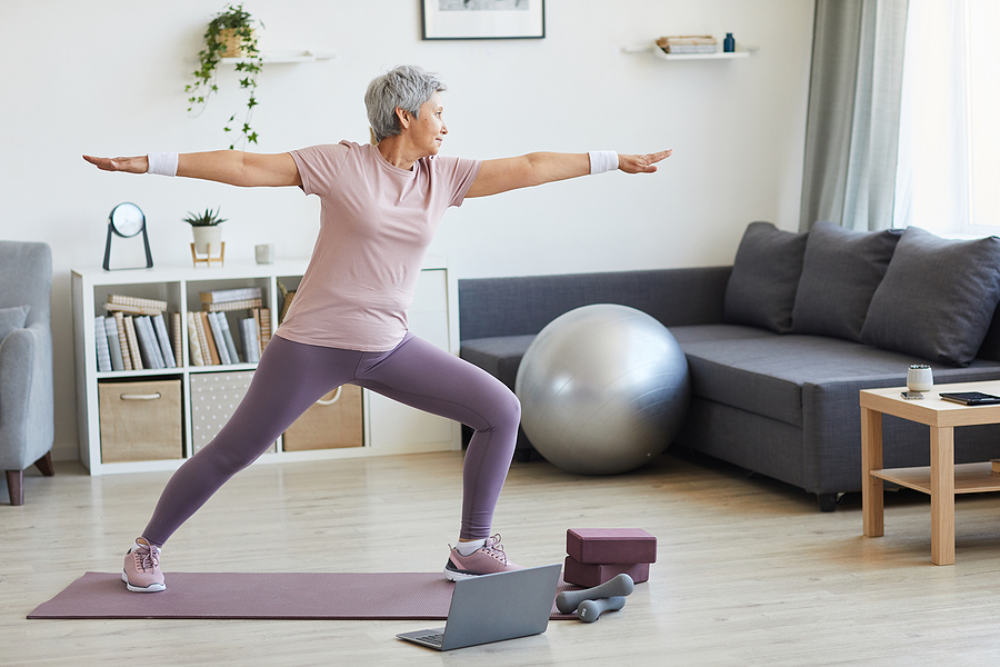 A person doing indoor exercises to stay active and healthy.